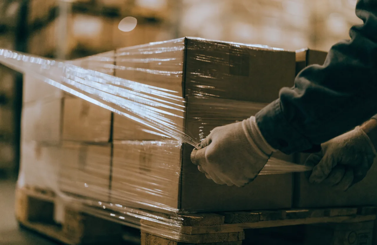 Pallets of liquidation stock staged for freight